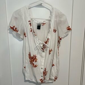 Elegant White and Orange Floral Blouse